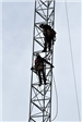 Two Construction Workers Working on the Yonkers Tower