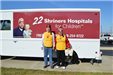 Shriners Hospital for Children Members beside Food Truck