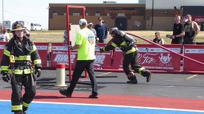 Fire Fighter Approaching a Door in the Challenge