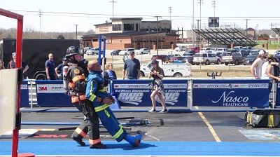 Blue Team Firefighter Hauling a Rescue Dummy 3