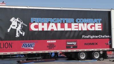 Firefighter Combat Challenge Banner on the Side of a Truck