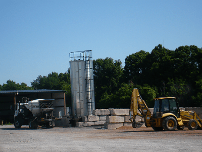 Gravel Spreader and Backhoe